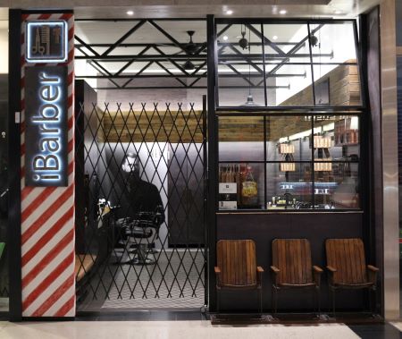 Phantom Electrical commercial electrician working on a hair salon fit-out in Melbourne